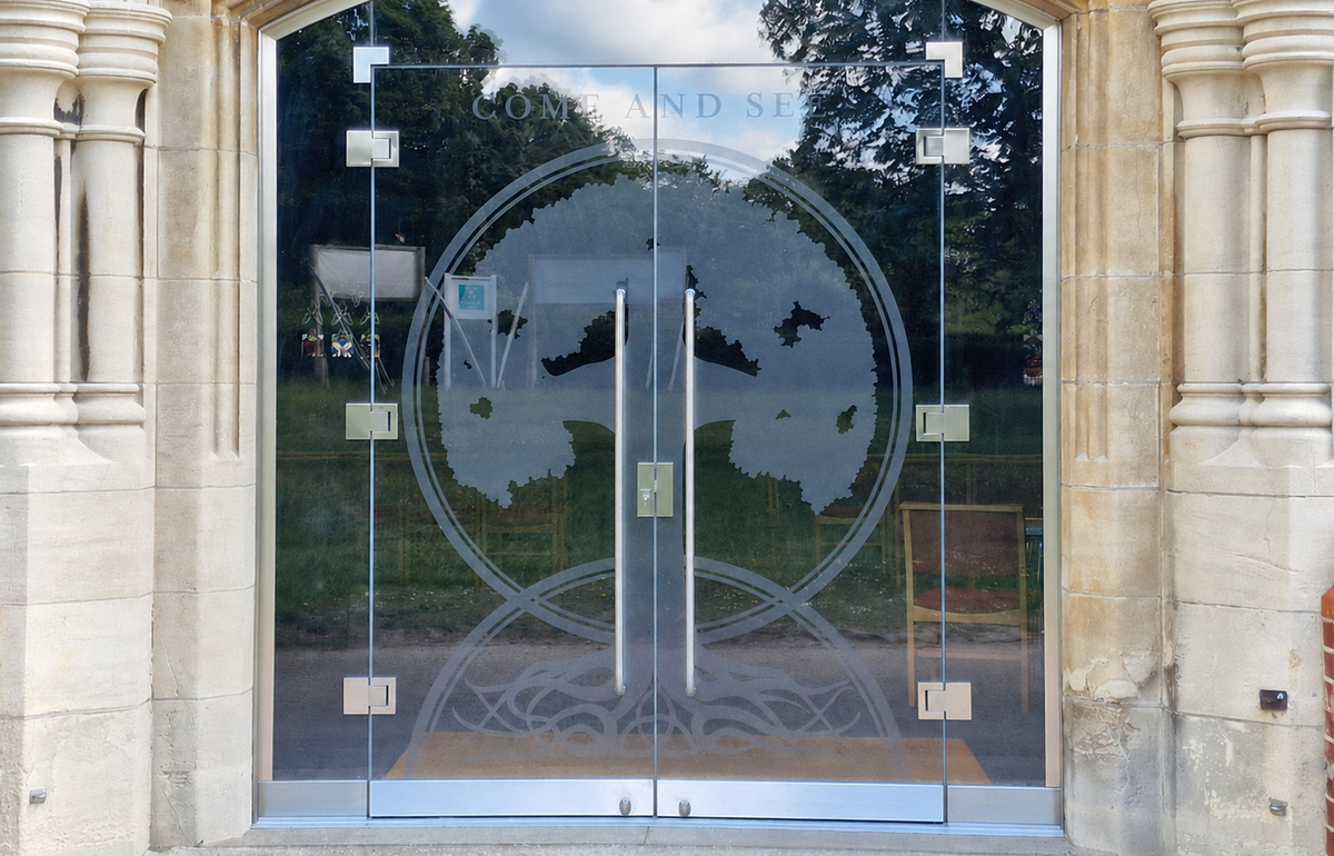 Intricate Frosted Window Film Installed on Church Glass Doors in Burgess Hill