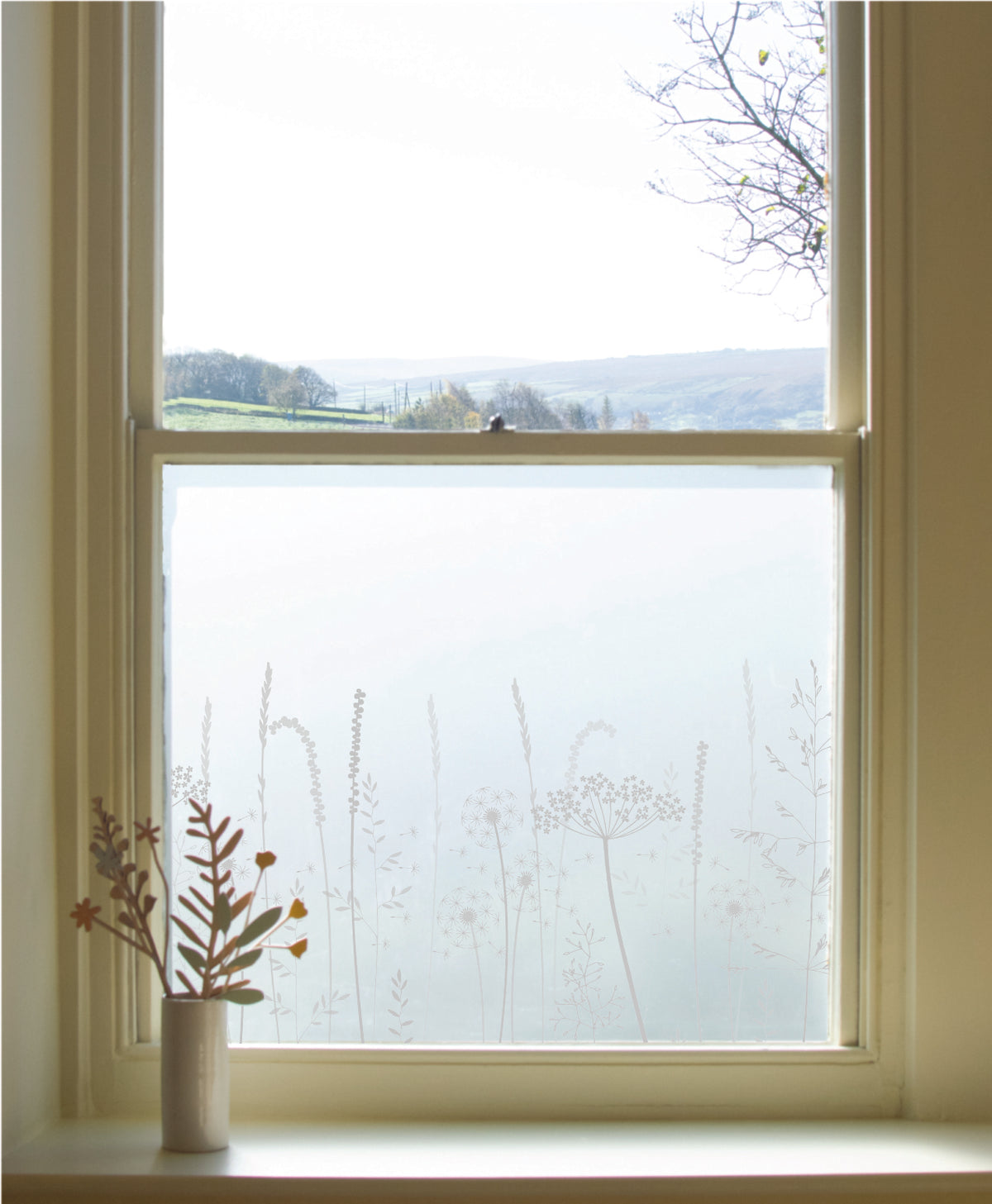 A residential property featuring Paper Meadows Edge by Hannah Nunn window film