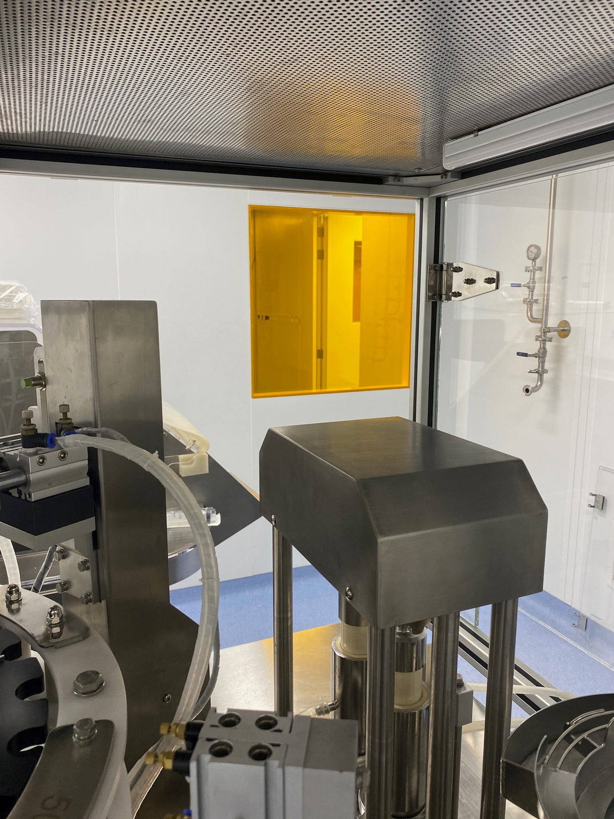 An internal image of a medical room with a single window. The window has Amber 81 UV protection window film applied.  