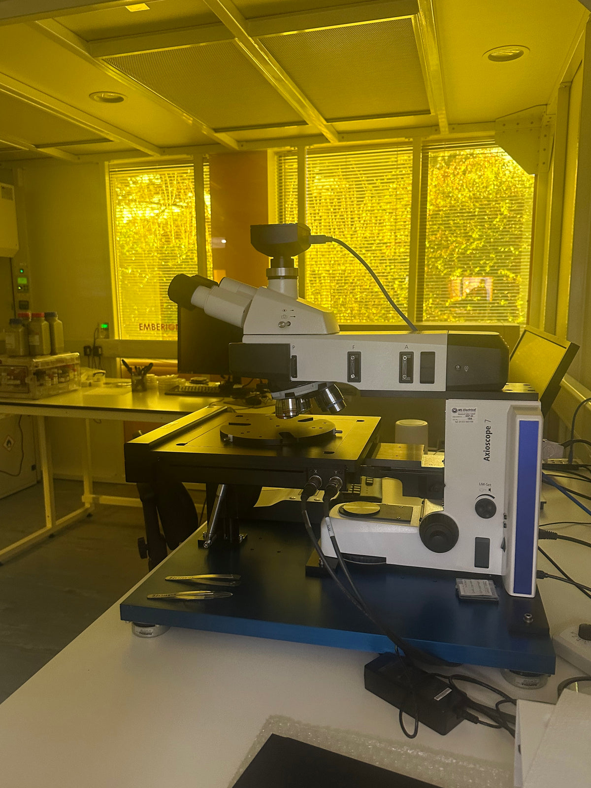 An internal view of a room containing medical equipment. the windows have been fitted with Amber 81 window film to provide the necessary protection from UV rays.