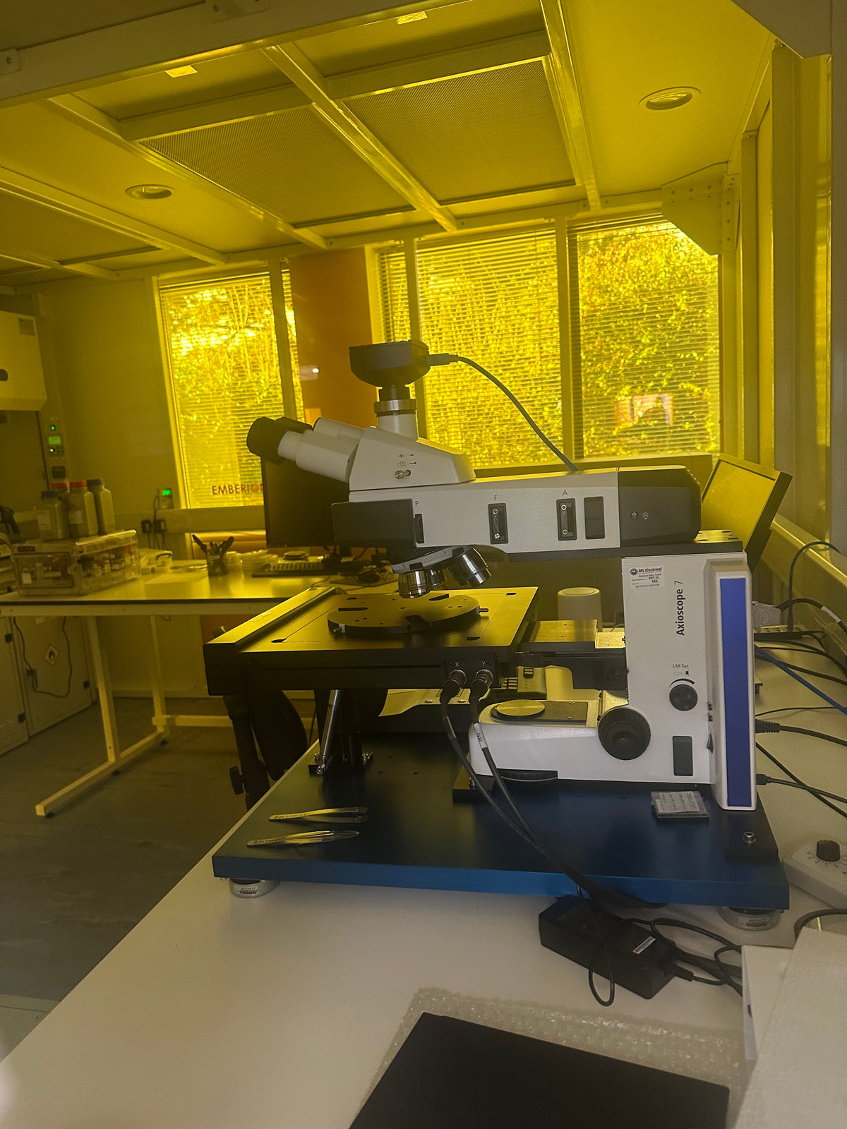 Laboratory with Amber 81 UV protection window film applied to the glazing, delivering a yellow hue.