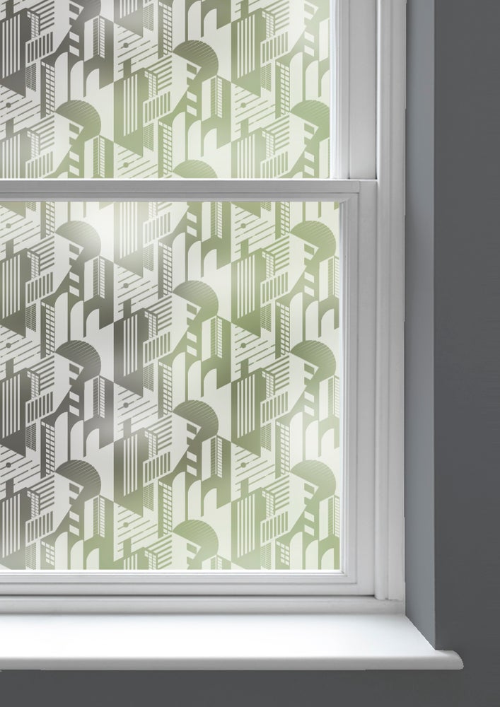 A window with Bauhaus patterned window film by Mini Moderns applied to both panes
