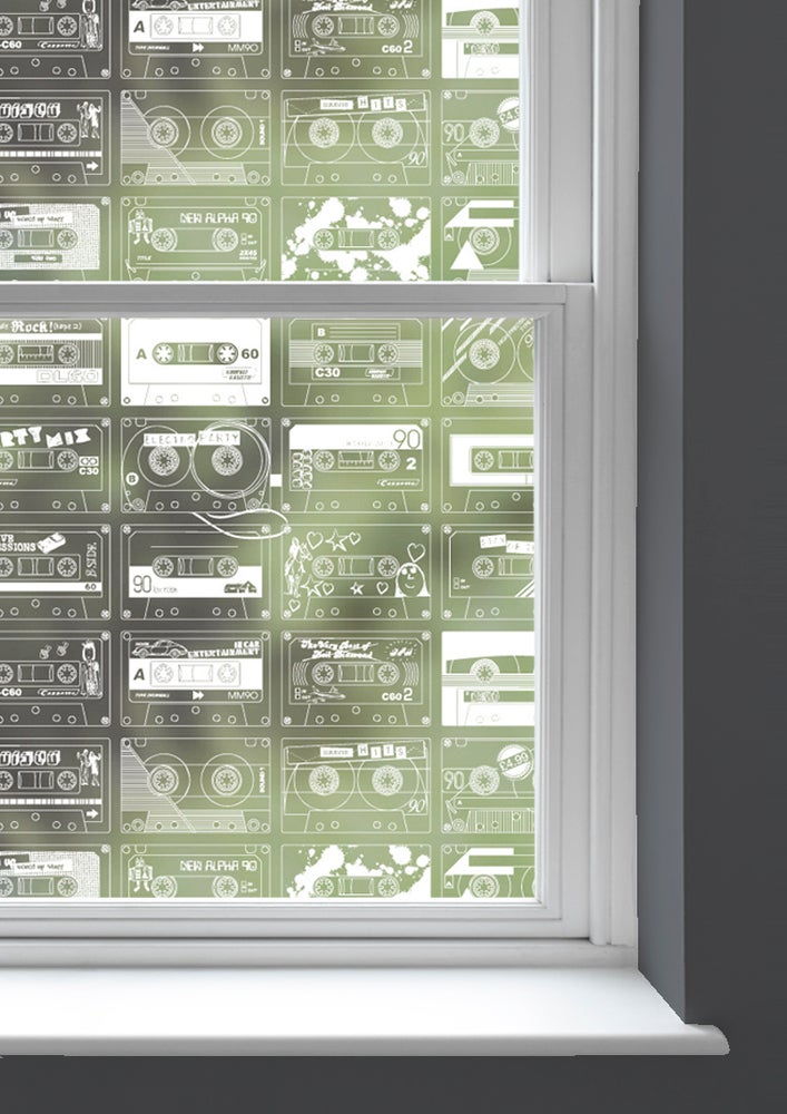 A window with C-60 patterned window film by Mini Moderns applied to both panes