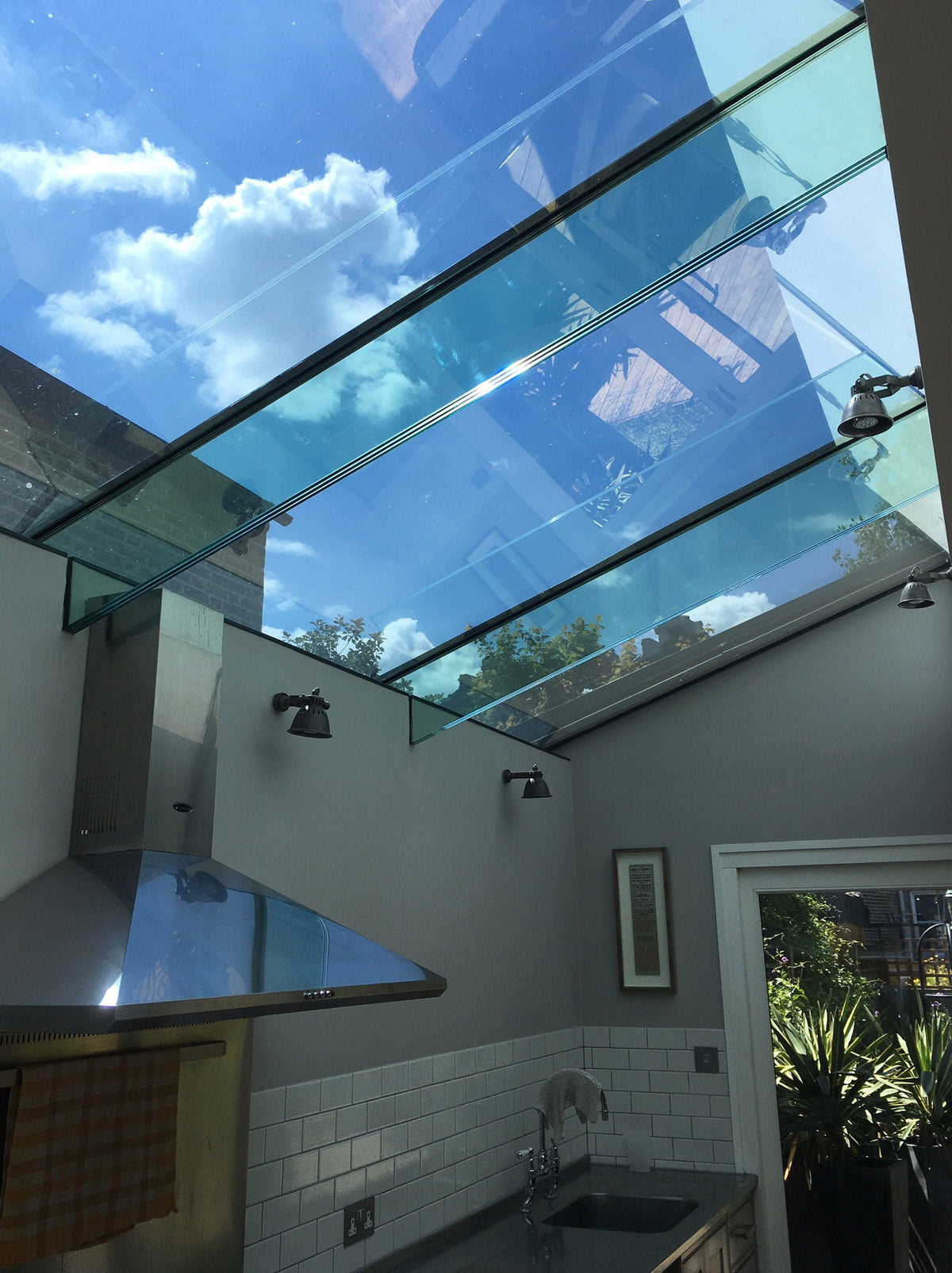 Glass roof in a home with Climate 35 heat reduction window film applied to the glazing. 