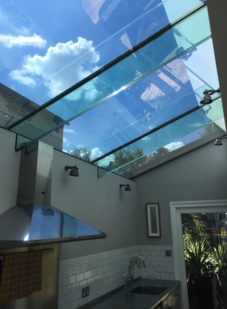 A modern kitchen skylight which has has solar control window film fitted to reduce heat and glare