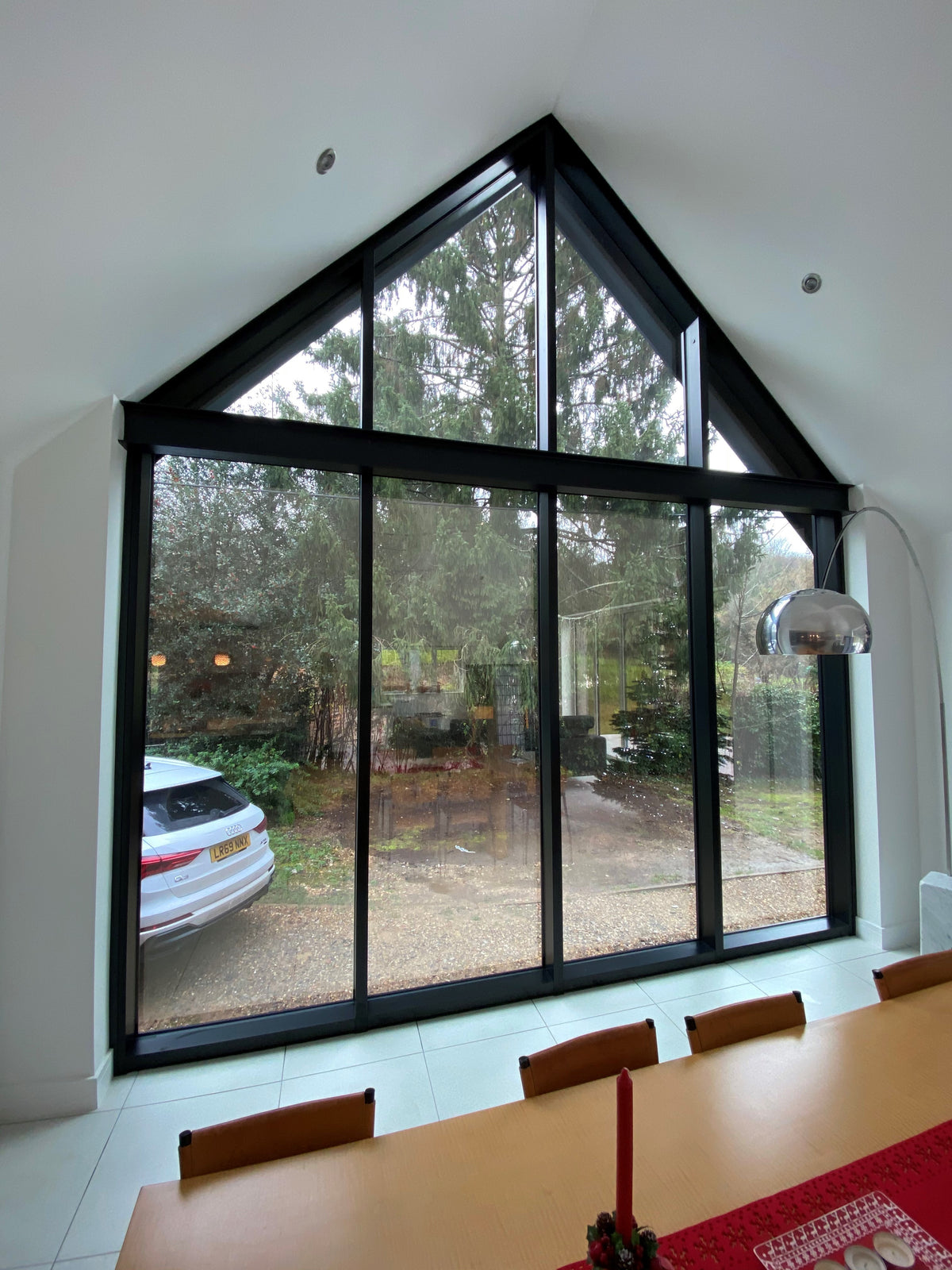 The view from the inside looking out through a triangular window that has had Climate 70 solar control window film applied to it.