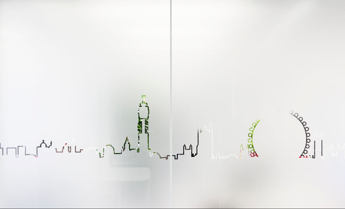 Decorative window film with city skyline design on a white background