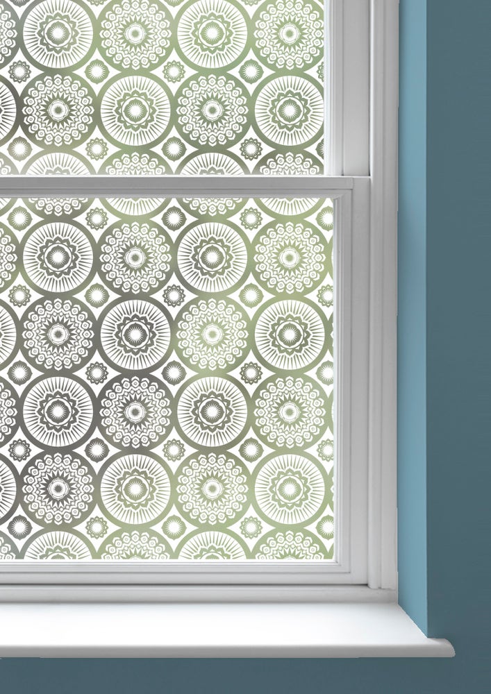 A window with Darjeeling patterned window film by Mini Moderns applied to both panes