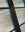 A close up of evoke reeded window film applied to aluminium doors.