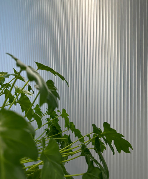 A frosted version of reeded window film.