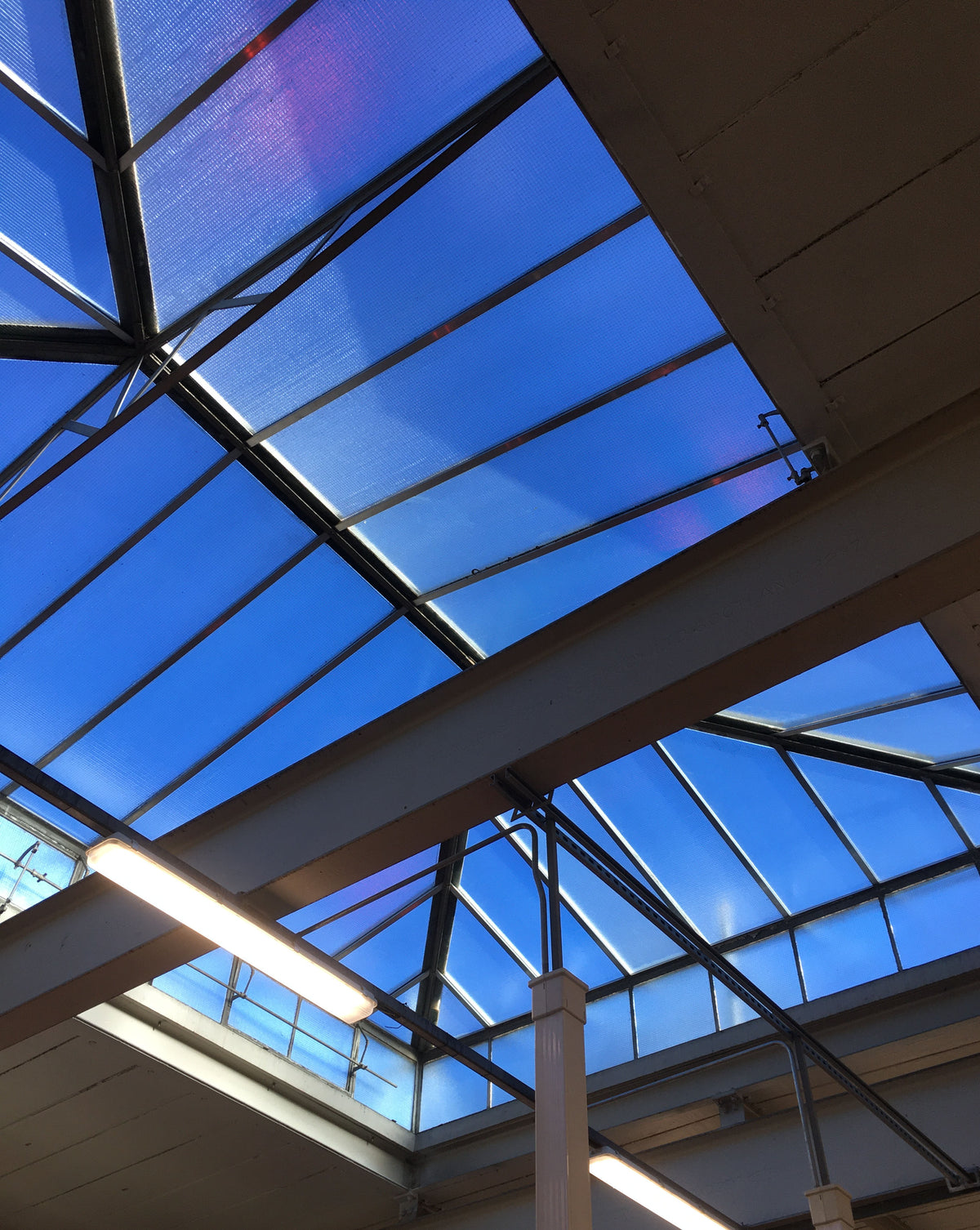 Skylight with solar control window film applied to the glass.
