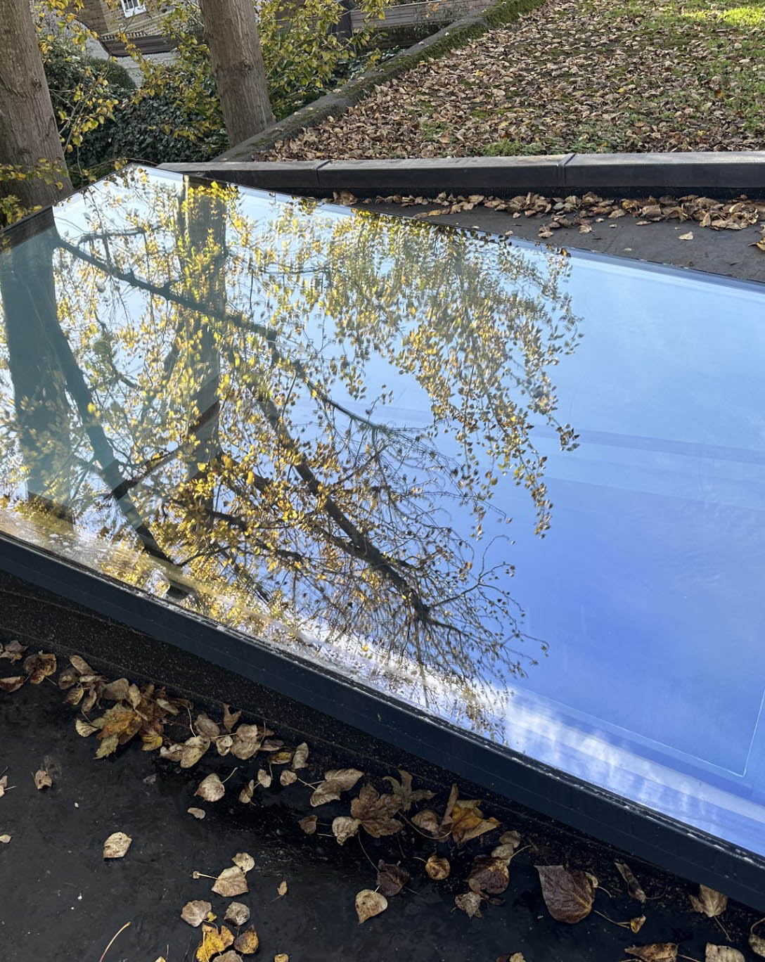 A rooflight with Light Reflective Silver heat reduction window film applied to the external face of the glass.
