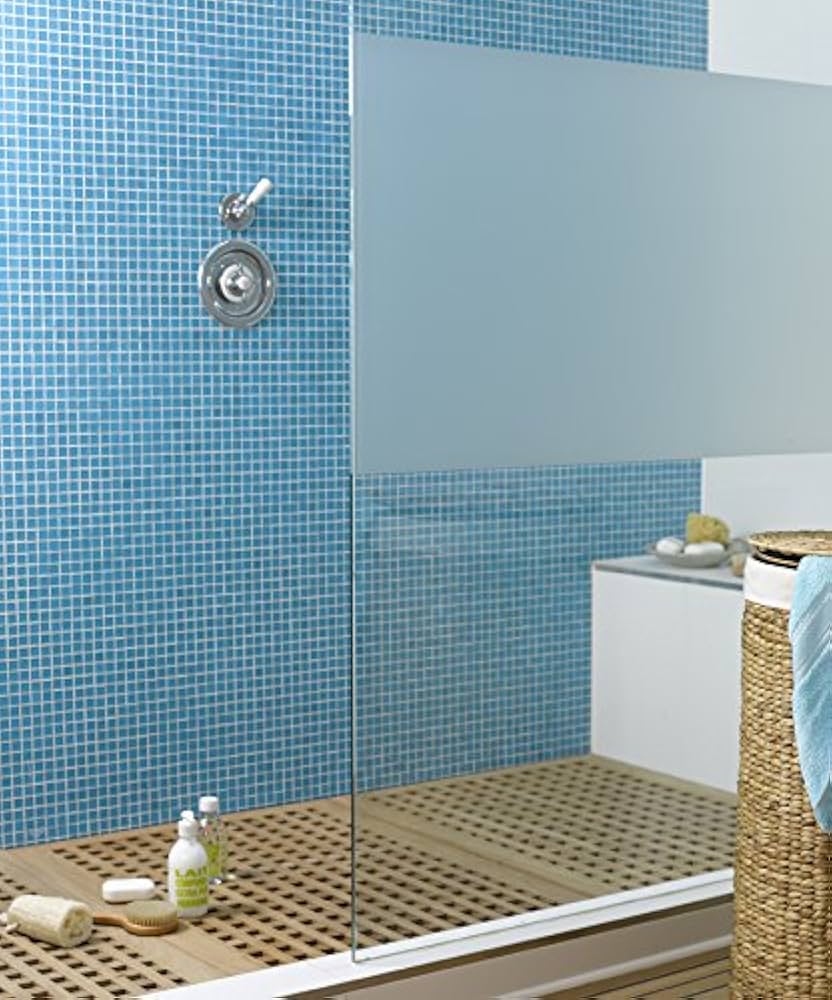 A shower screen featuring a panel of frosted window film. The window film provides both an element of privacy and a decorative element.