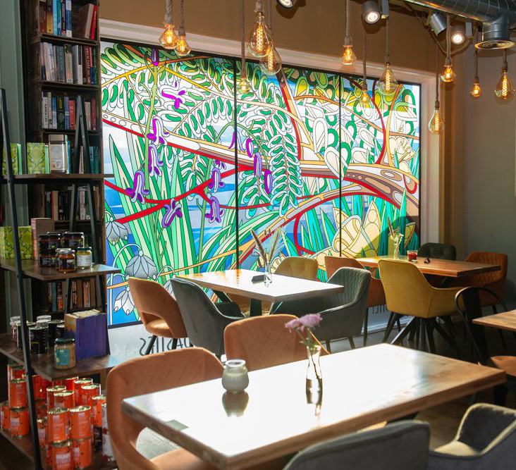 A rainforest design which has been printed onto a window film and installed to the windows of a cafe.