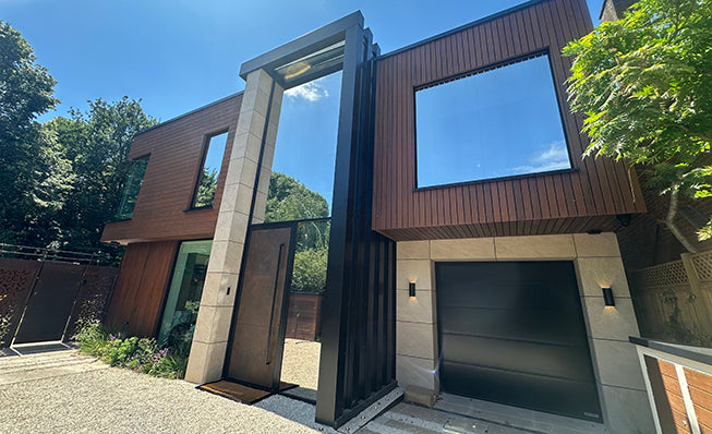 Large windows with heat reducing window film applied for solar control