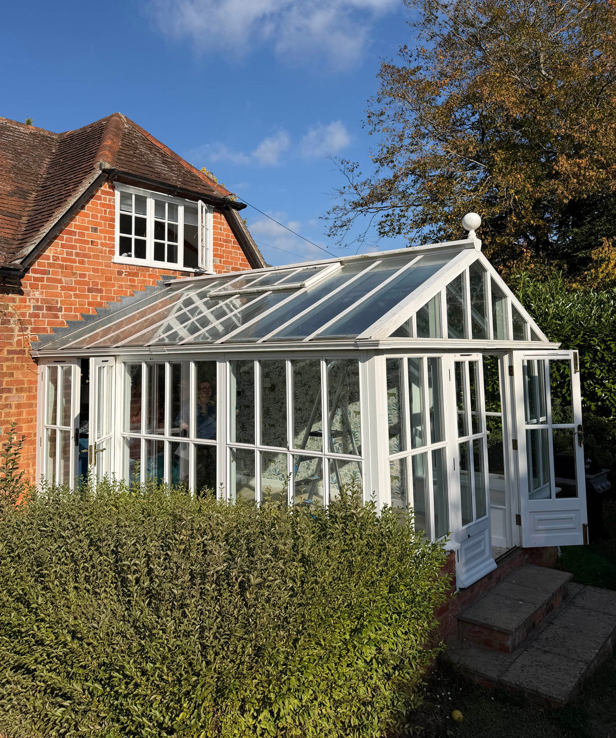 Conservatory with light reflective solar control window film applied to the glass roof.
