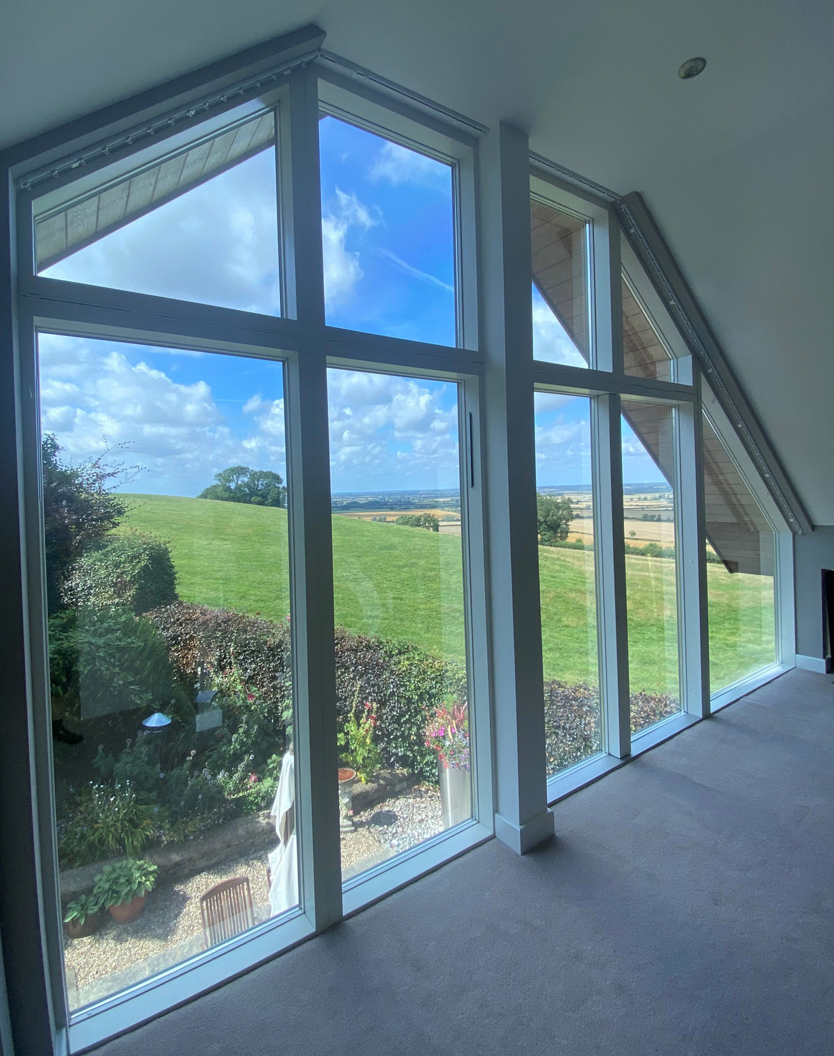 Internal view of a large window split into multiple panes, with solar control window film applied. 