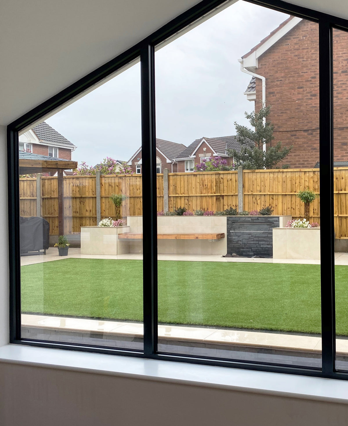 Inside of a house looking out through a window which has had a medium grade solar film installed.