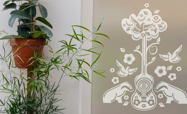A close up of a stylish Mini Moderns design, printed in brilliant white ink onto frosted window film.