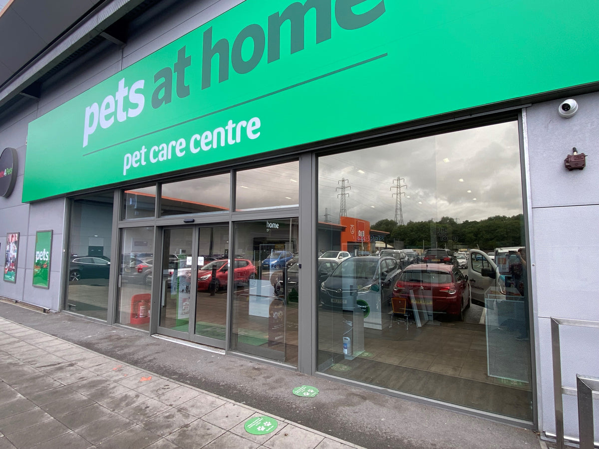 External view of a Pets at Home retail store with heat and glare reduction window film applied to the glass frontage.