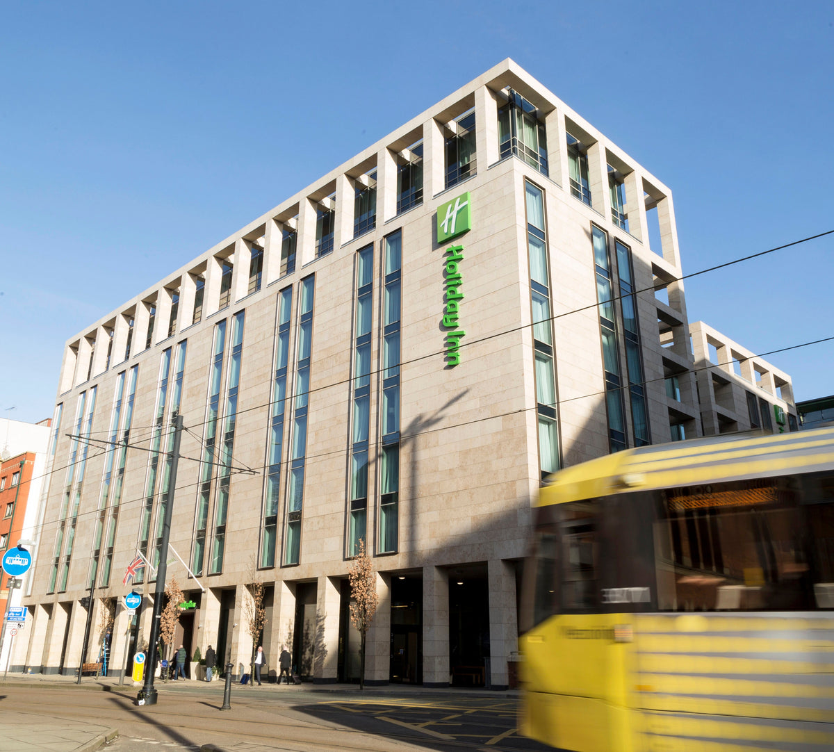 Window film applied to the glazing of Holiday Inn in Manchester to help make the glass shatter resistant.