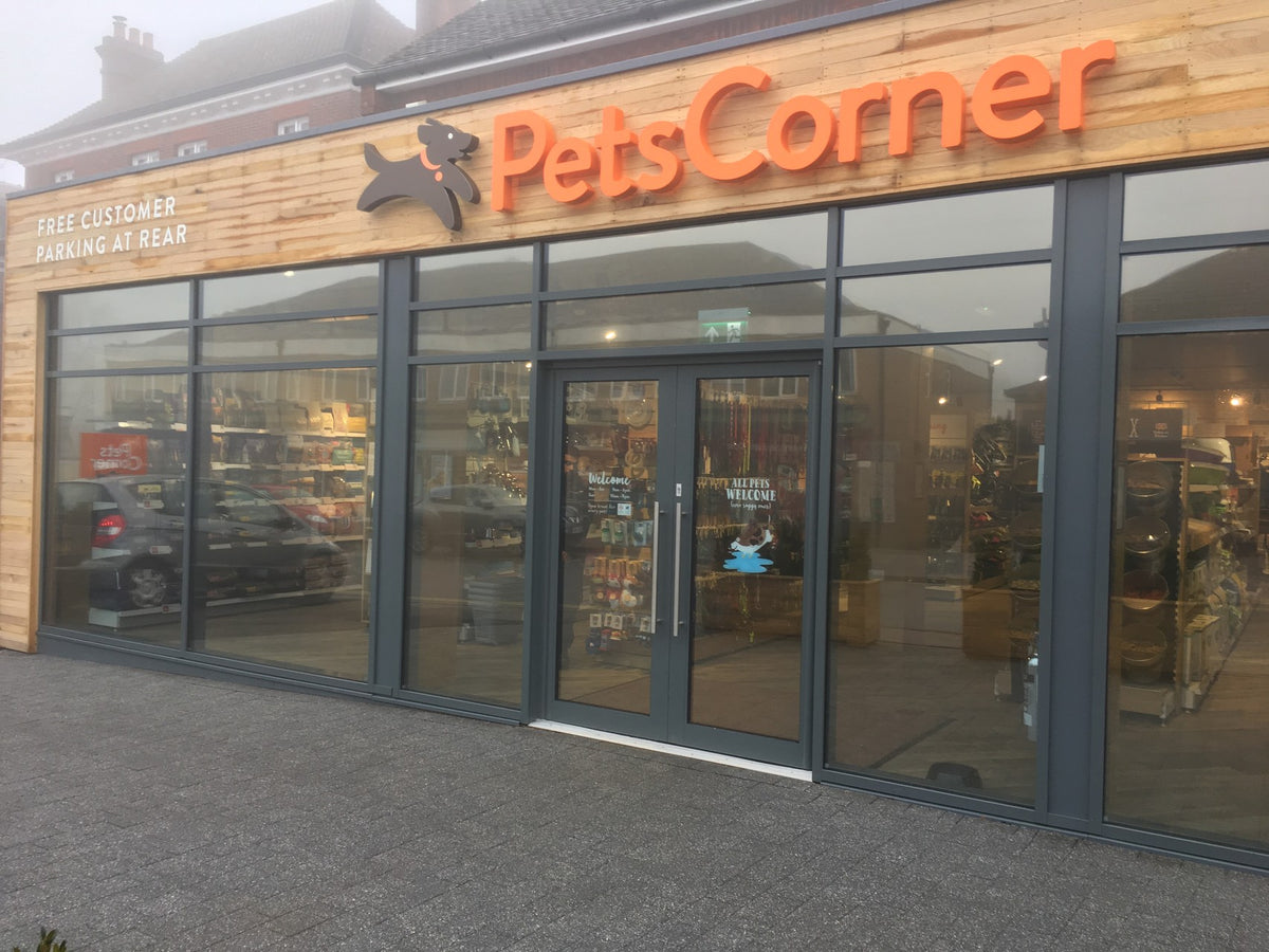 Pets Corner store front with large glass windows with solar control and glare reduction window film applied to the glass.