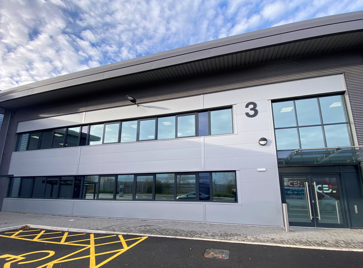 A modern two-story office block which has solar control window film applied to the glazing to reduce heat build up.