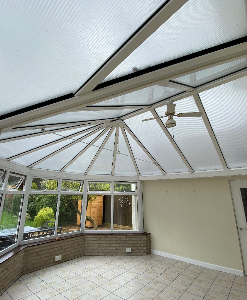 A conservatory sunroom with solar control window film applied to the inside of the roof.