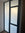 A multi pane window with white matt frosted privacy window film applied to it.