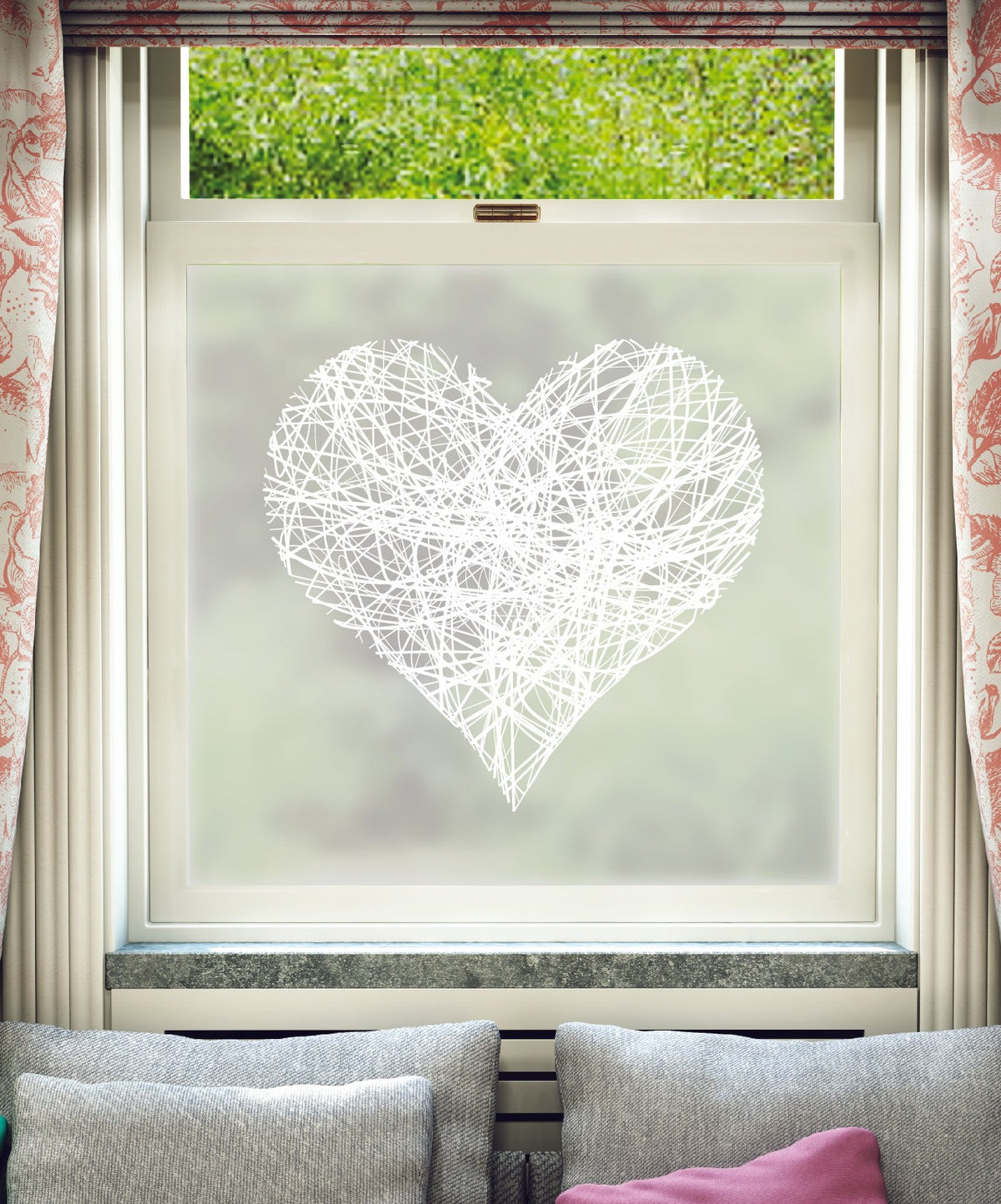 White printed frosted window film with Corazon heart pattern.