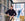 Two installers from The Window Film Company carrying out a window film installation at the Holiday Inn hotel in Manchester